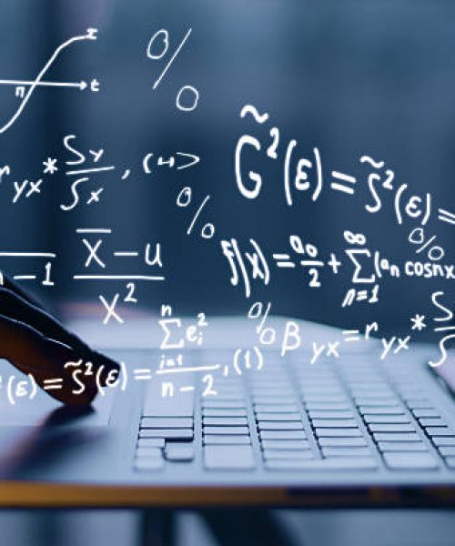 Hands using laptop with mathematical formulas. Online education concept